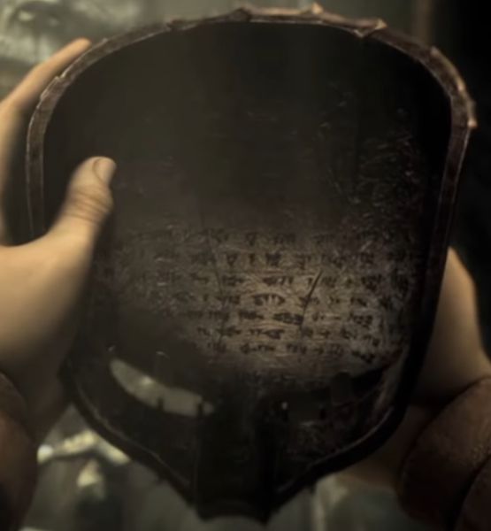 What is the message in the Sand Wraith mask? Does anyone have the original Persian Cuneiform of it? I am getting a replica of this mask and I want to get it done as authentically as possible. Thanks for the help.