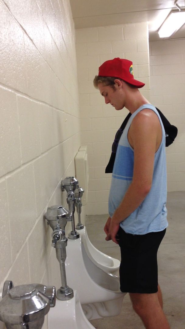 Young Guy Preparing To Piss Scrolller