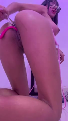 The model loves being spanked and having her open ass masturbated.