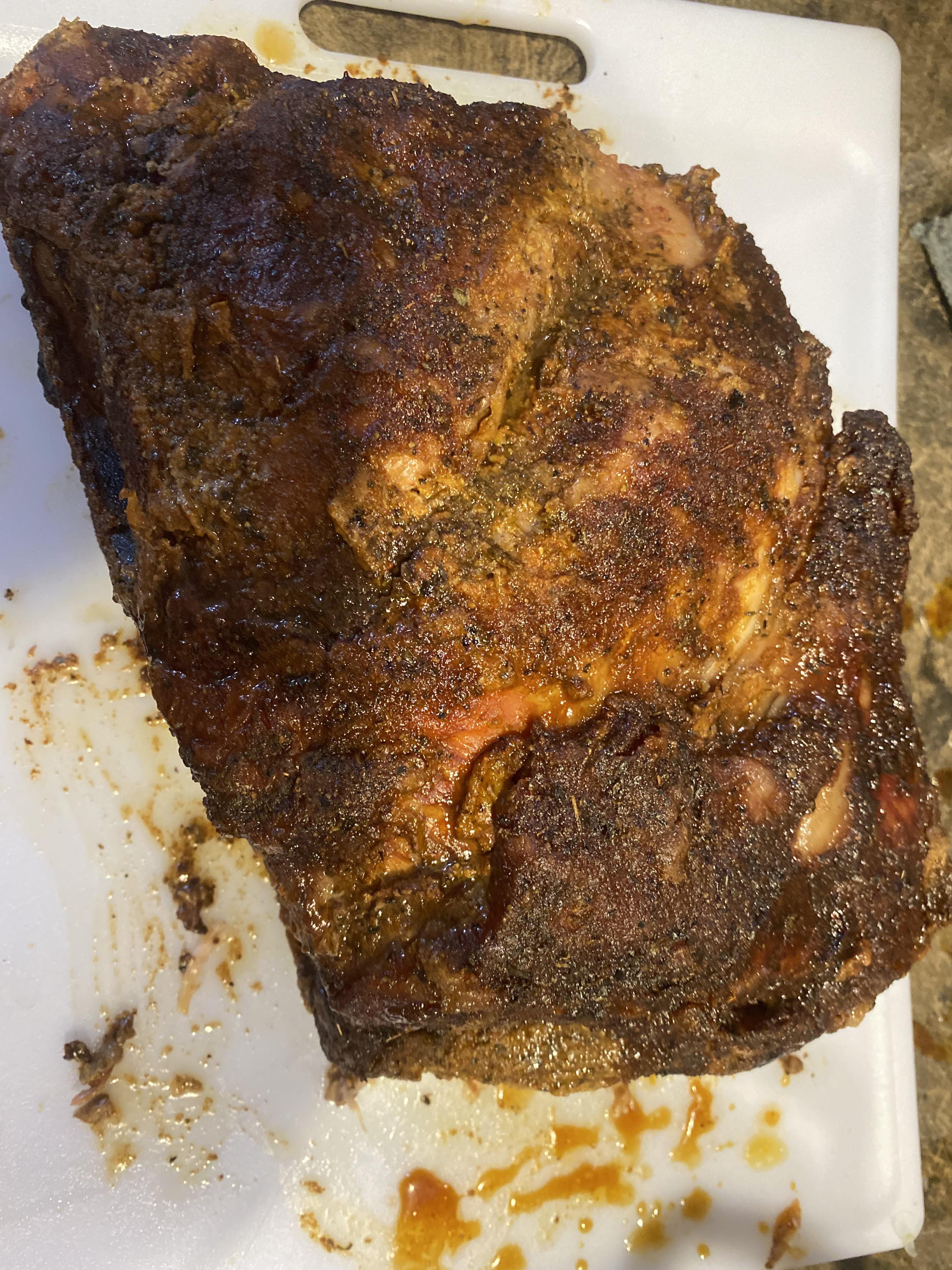 14 hrs pulled pork butt cooked at 225 degrees.. slow and low Scrolller