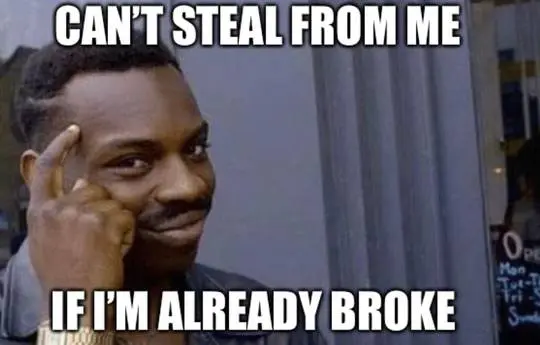 Dank meme of a man in a dark jacket pointing to his head with text about being broke