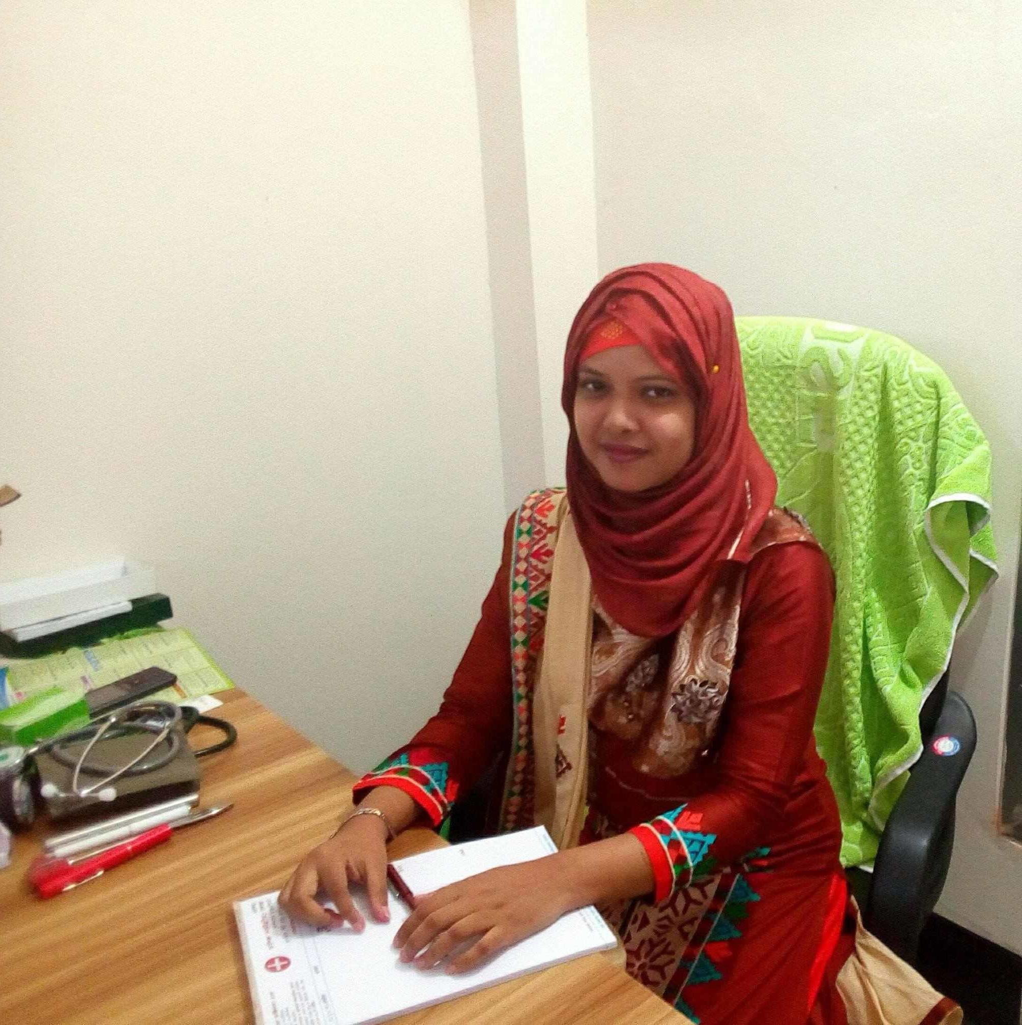 A Young Very Bangladeshi Doctor Giving Treatment a patient With Hard