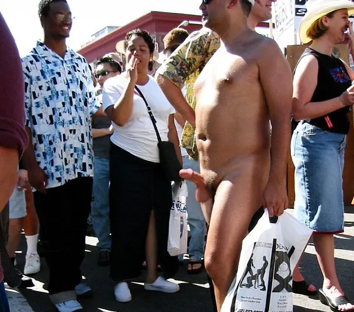 An amusing erection in public at the Folsom Street Fair...the girls are having a look and giggle.