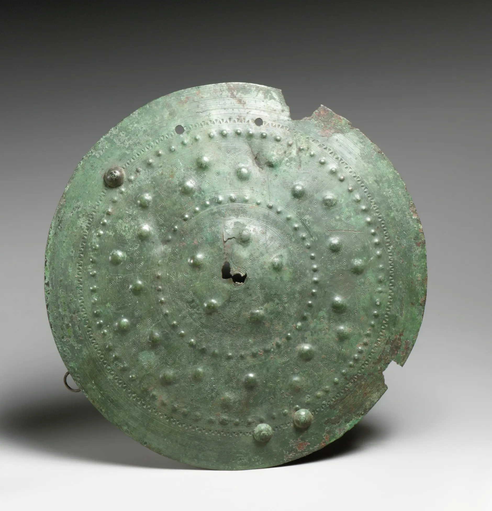 Shield Boss R Ancient bronze shield boss made somewhere in Italy, c. 7th century BCE ...