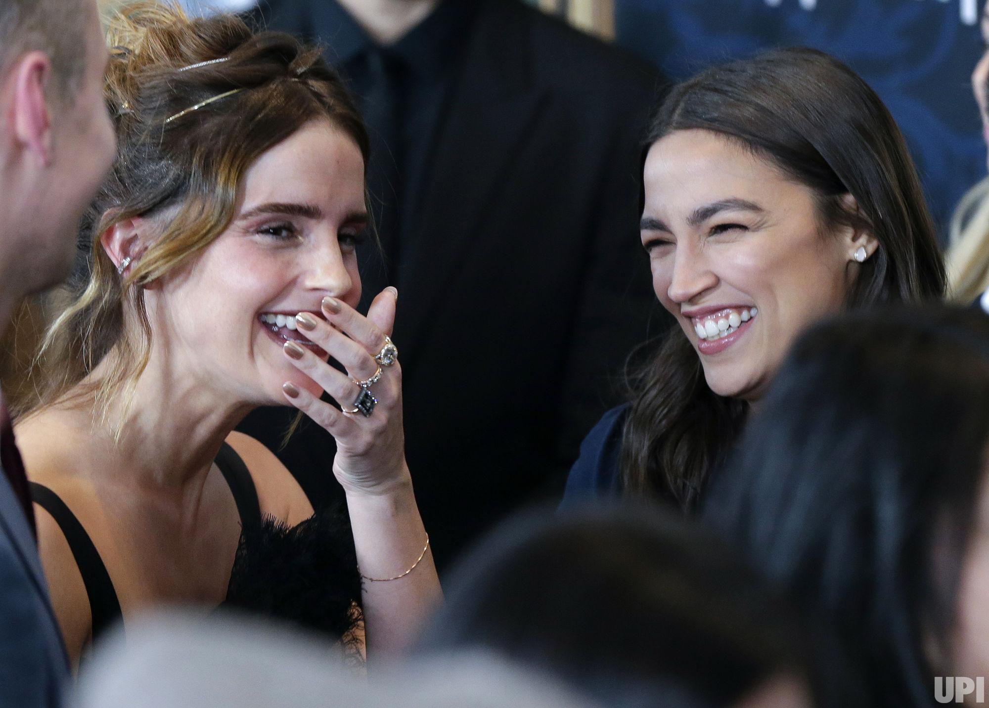 AOC and Emma Watson laughing after seeing you standing with your tiny ...