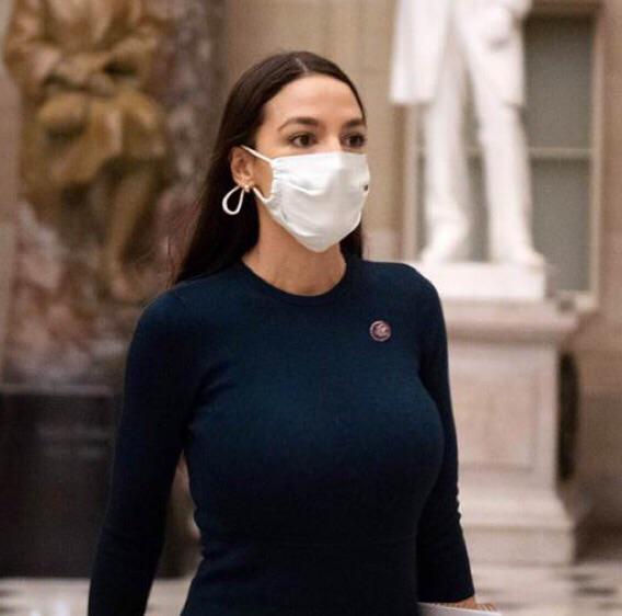 AOC walking through Statuary Hall .. | Scrolller