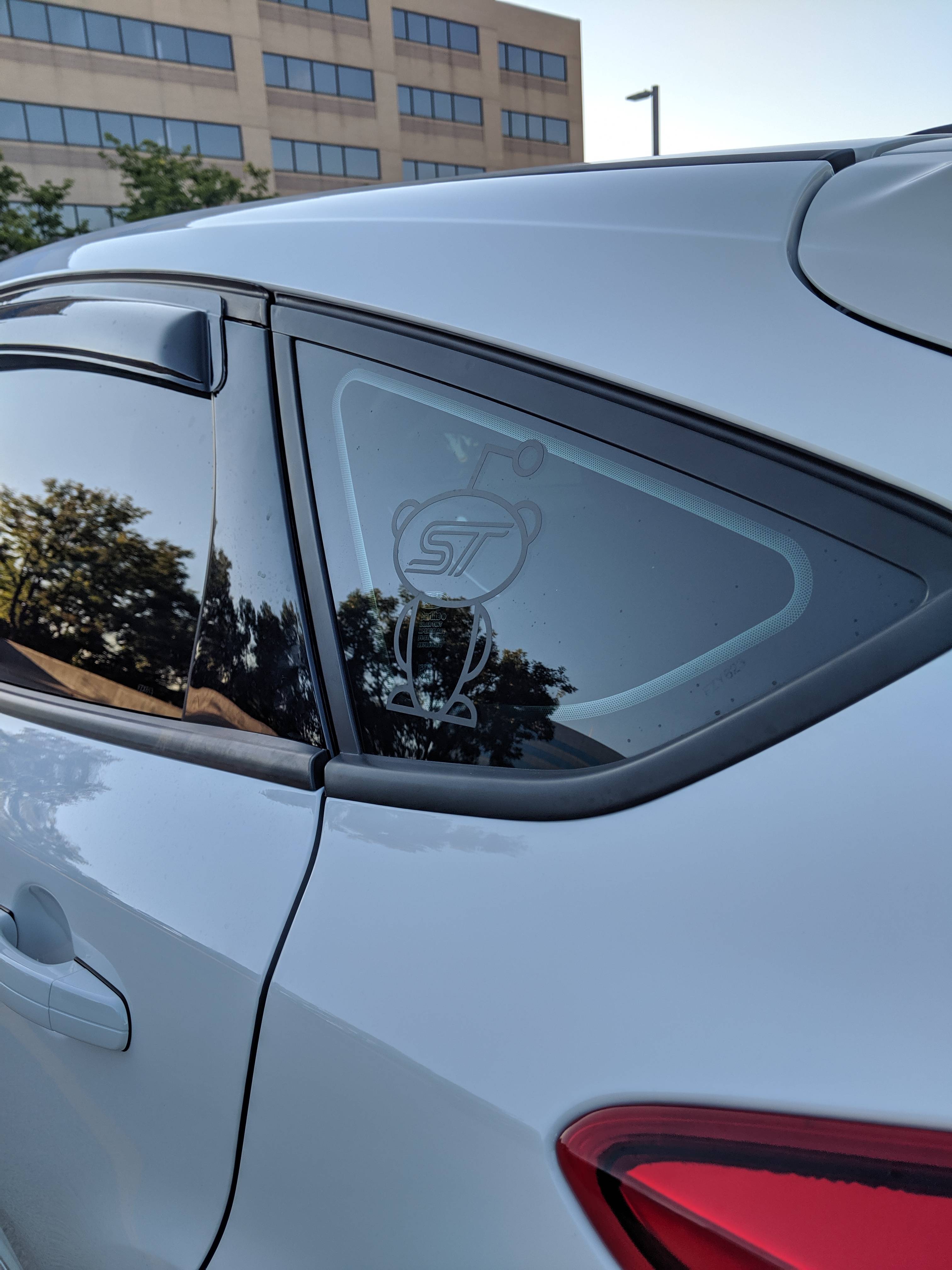 Black sticker on a tinted window 10/10 Scrolller