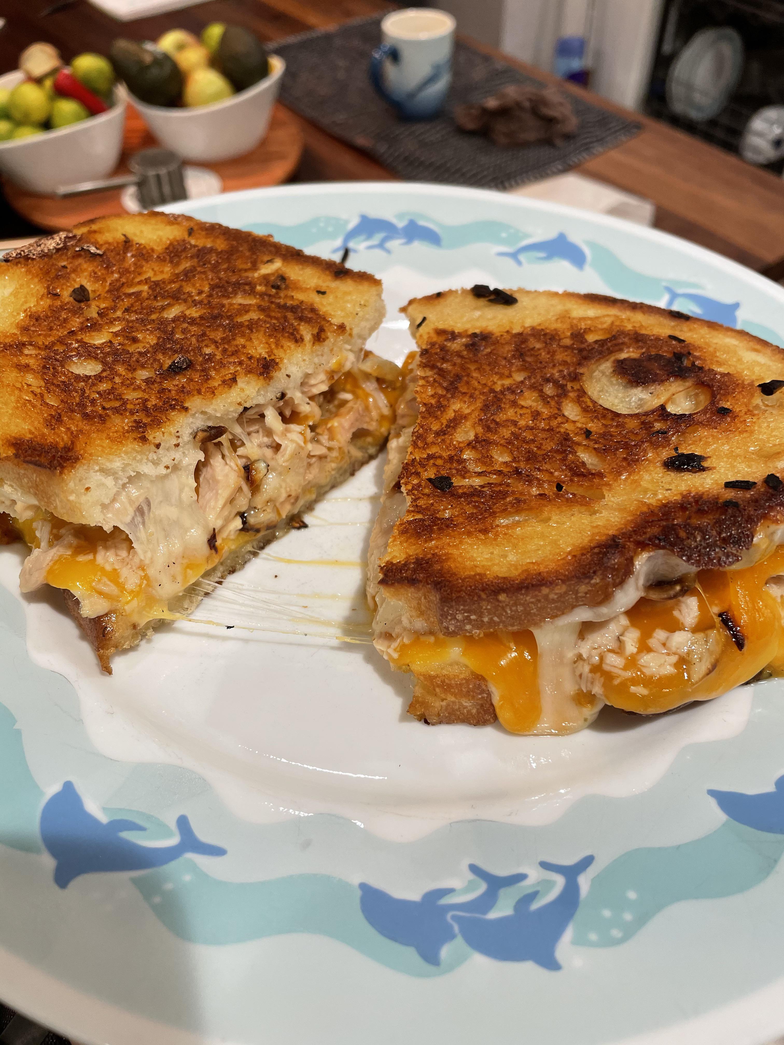 Cheddar, provolone, tuna, and a lot of chopped garlic | Scrolller