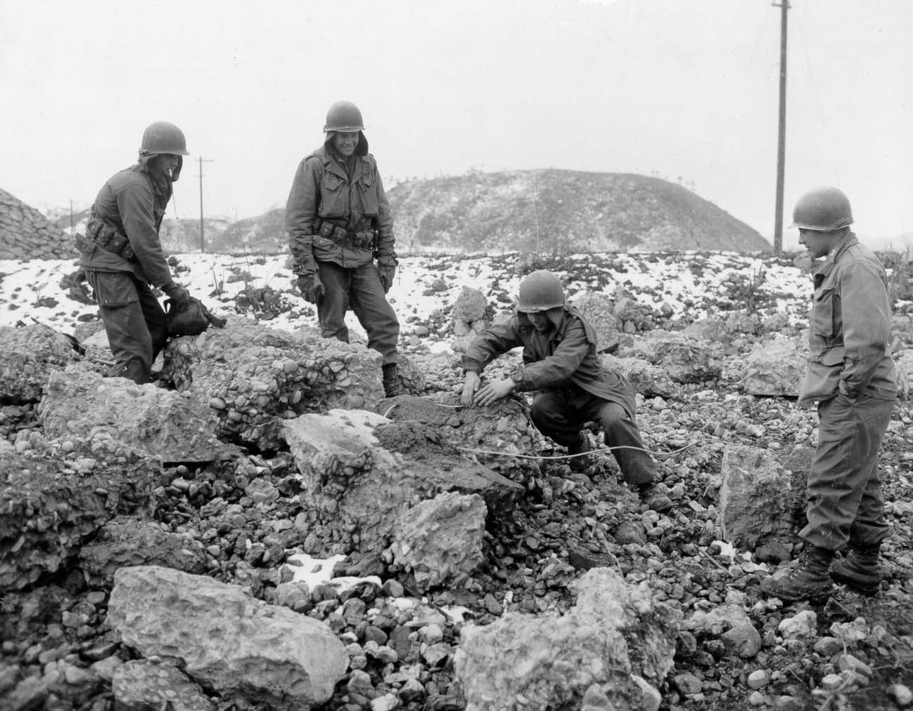 Combat Engineers from the 24th Infantry Division prepare to blow away ...