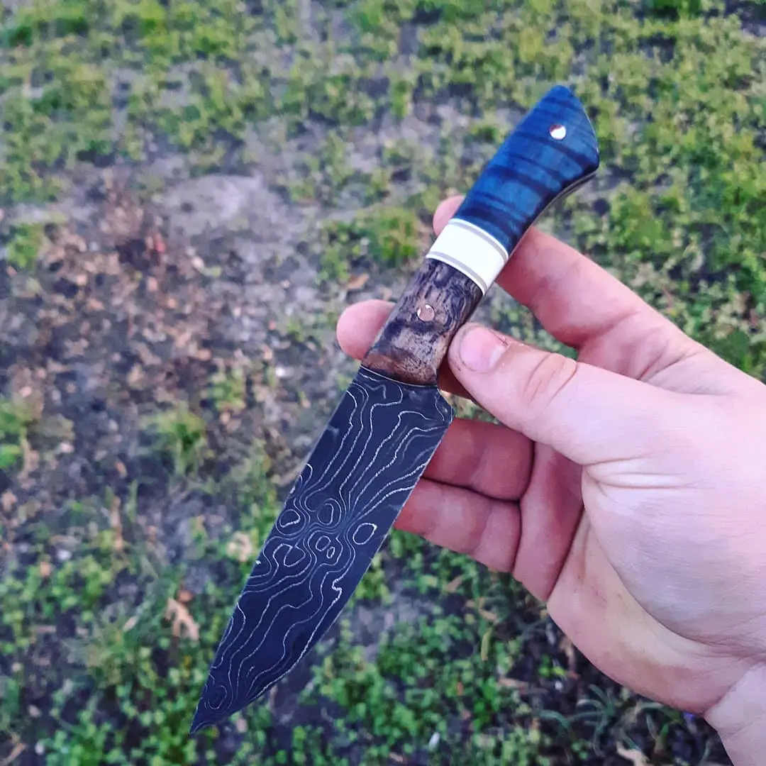 Damascus drop point skinner. With absolutely awesome scales made from ...