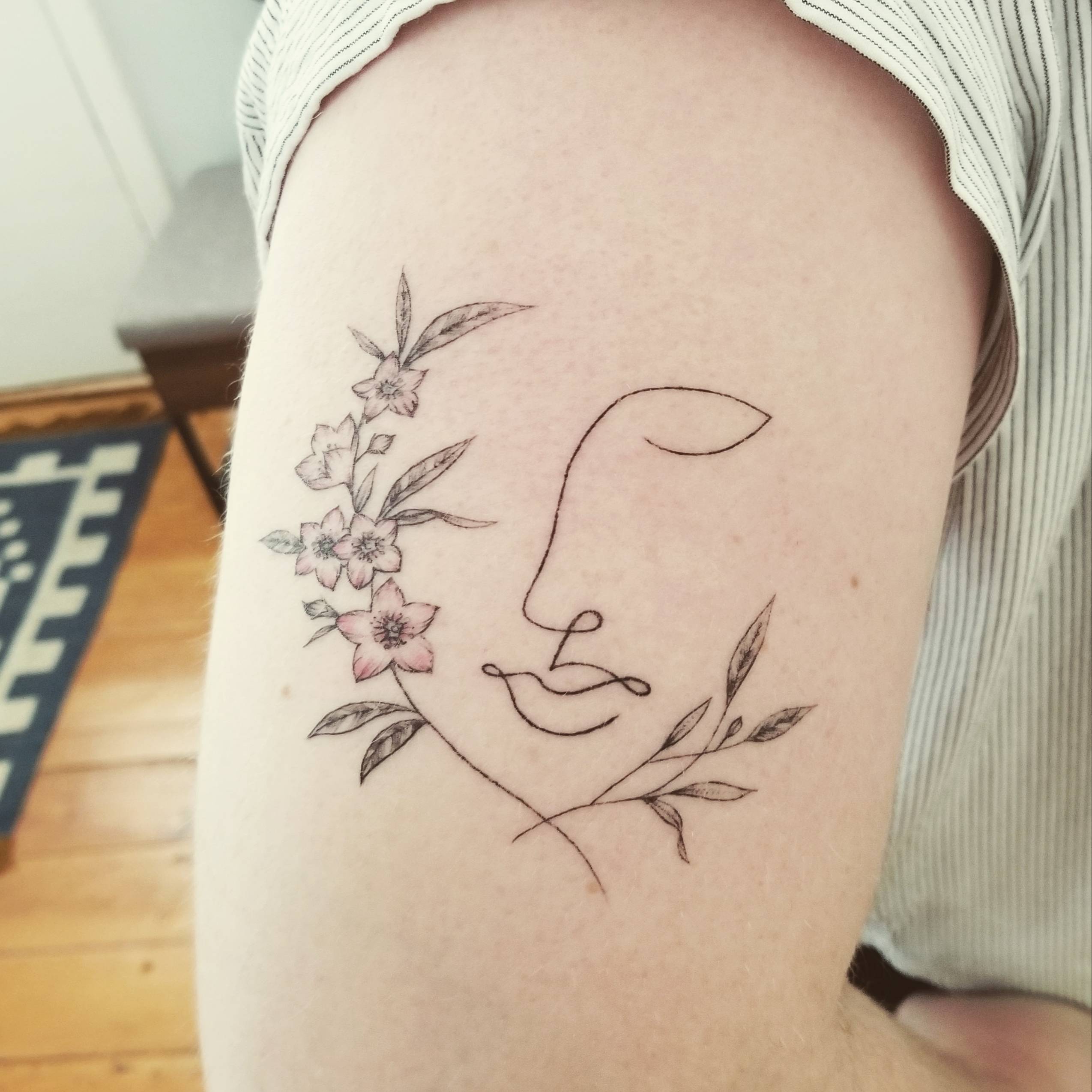 Delicate face tattoo by Caity Rose at Perigee Moon in Cape May, NJ