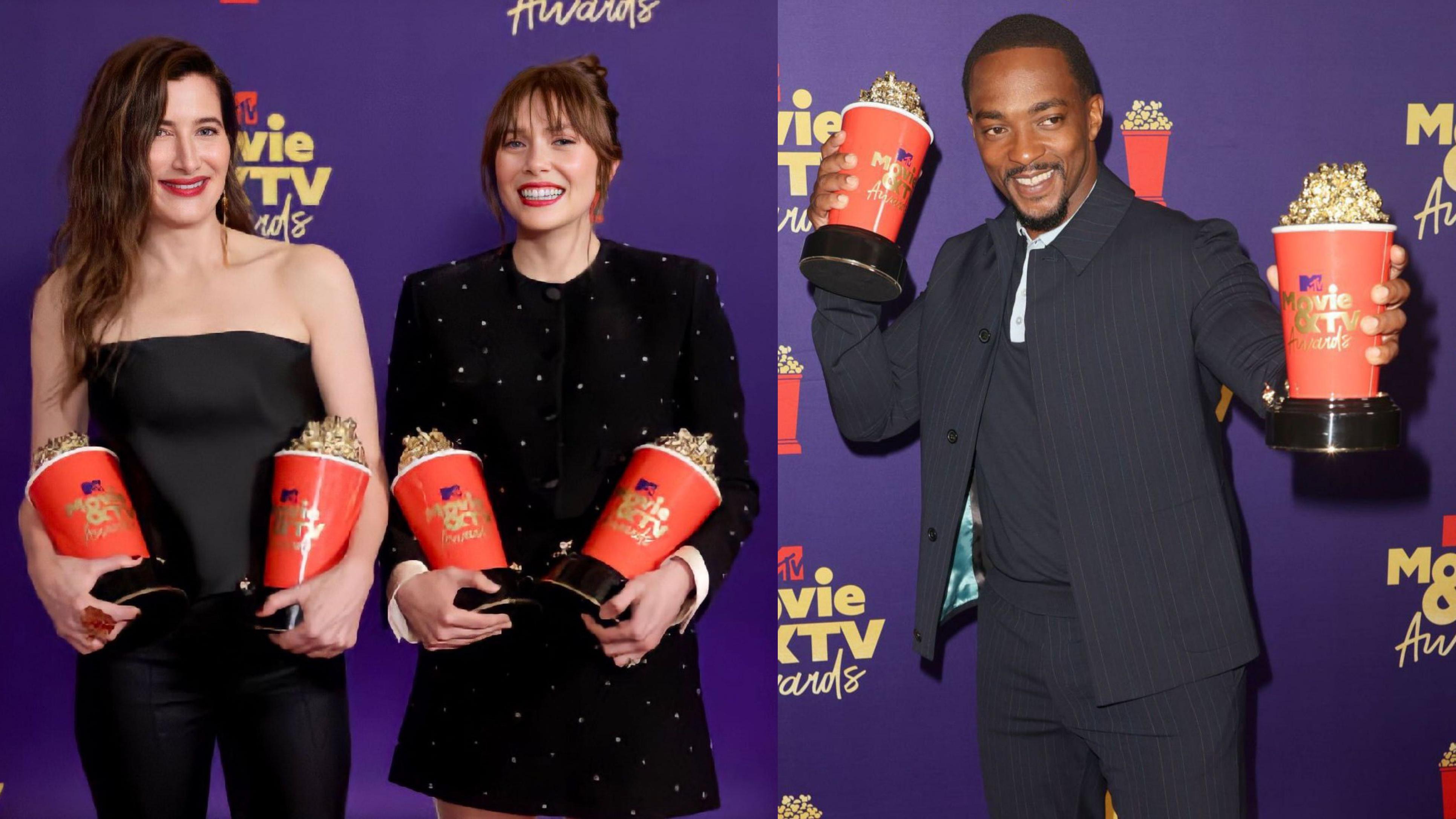 Elizabeth Olsen, Kathryn Hahn, and Anthony Mackie posing with Marvel's