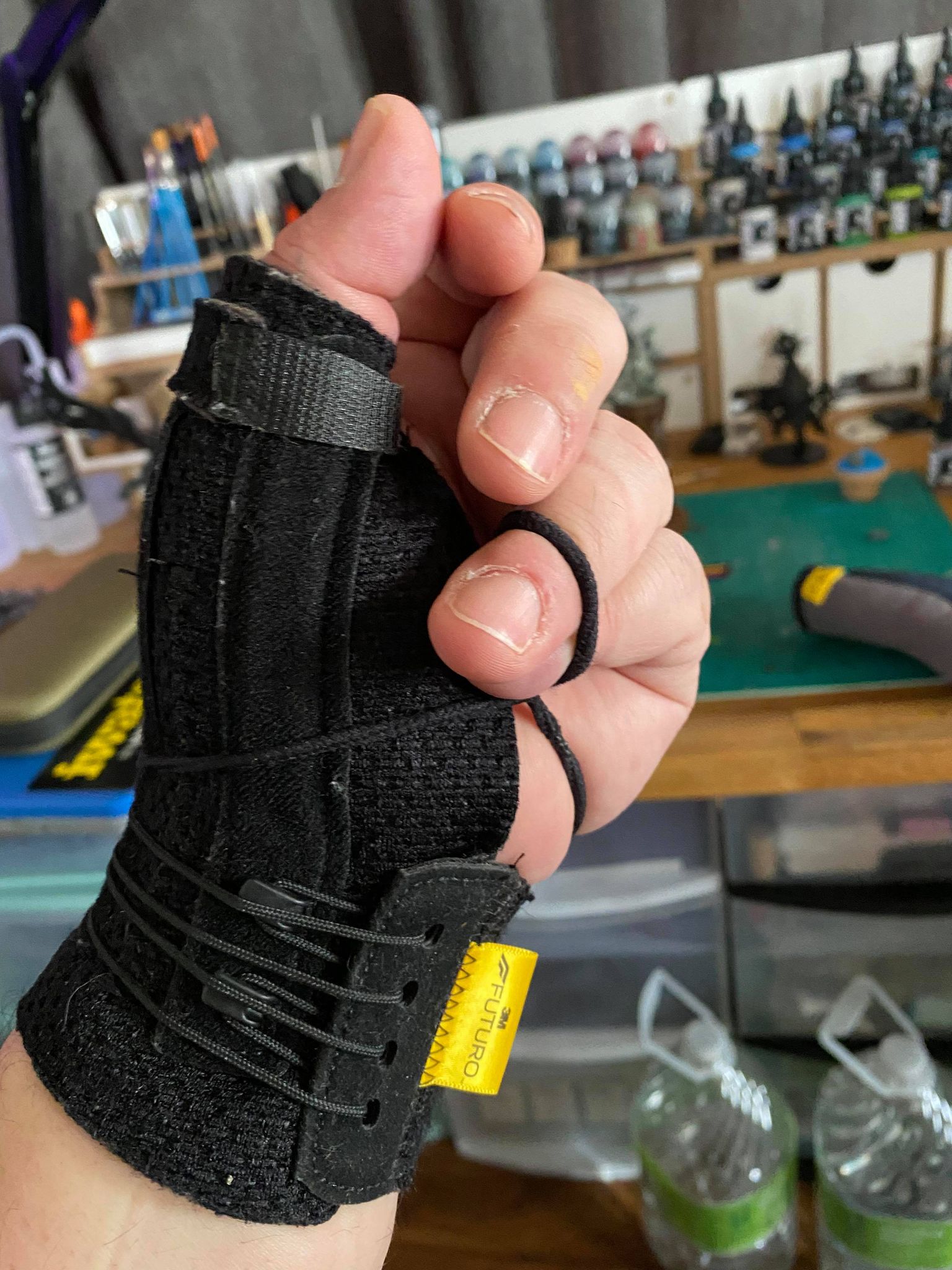 Essential tremors or just tremors this helps a lot. Wrist strap and a