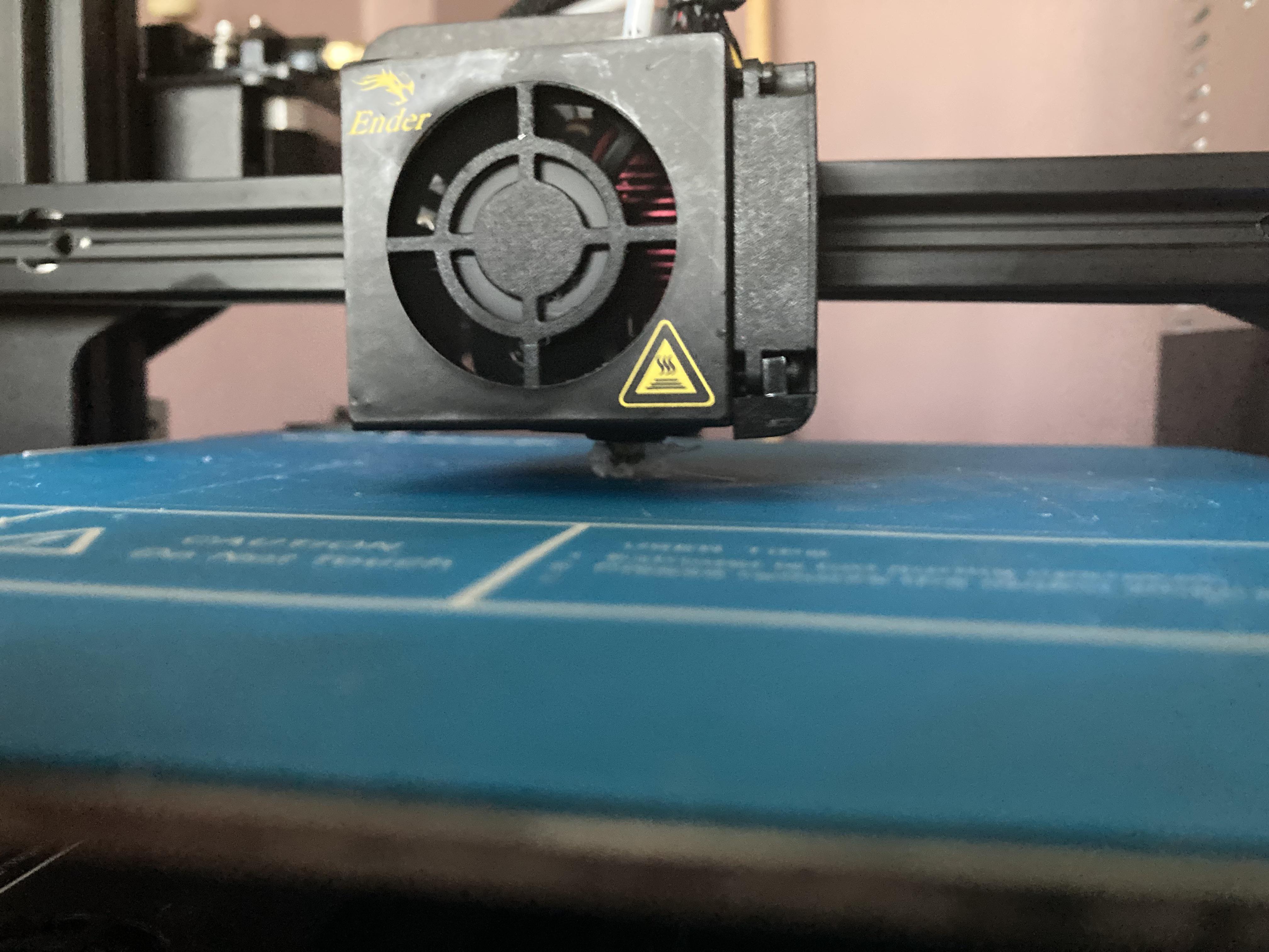 Filament building up on nozzle and not sticking to bed? Scrolller