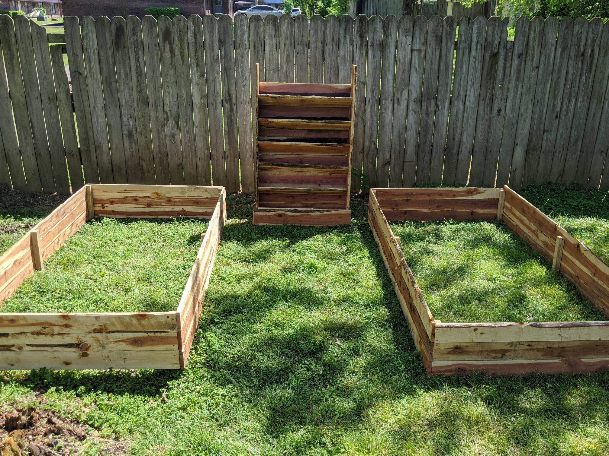 Finished building my cedar raised beds and vertical herb planter! Scrolller