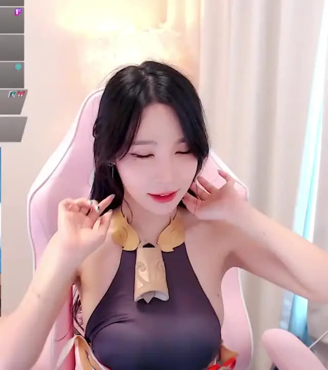Fixing her hair