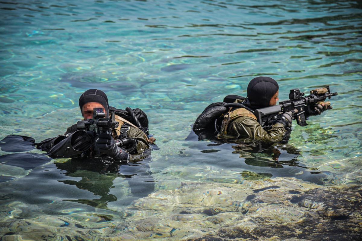 Greek OYK operators during a coastal clearing exercise somewhere in the ...
