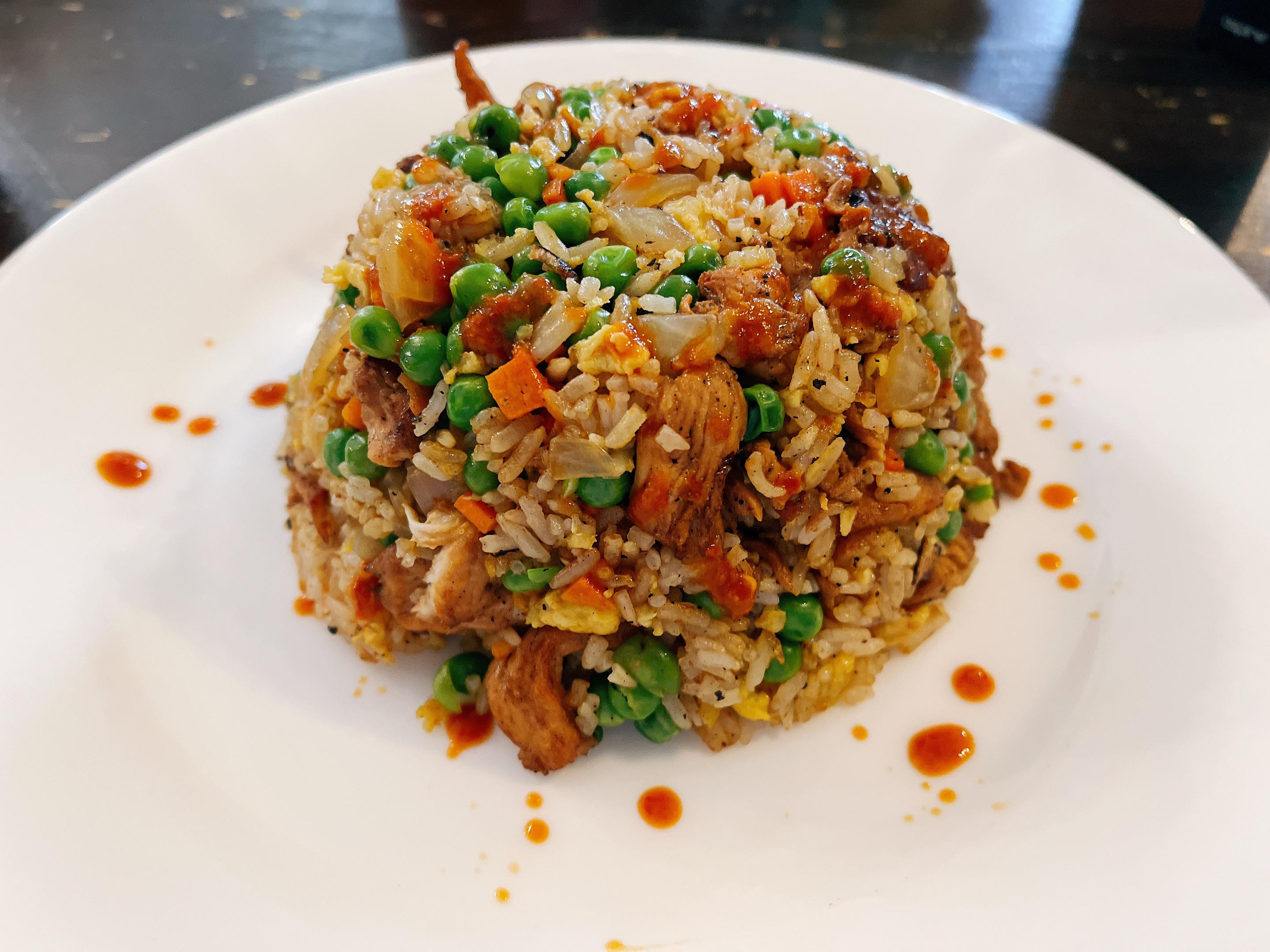[homemade] chicken fried rice with Sichuan hot sauce. | Scrolller