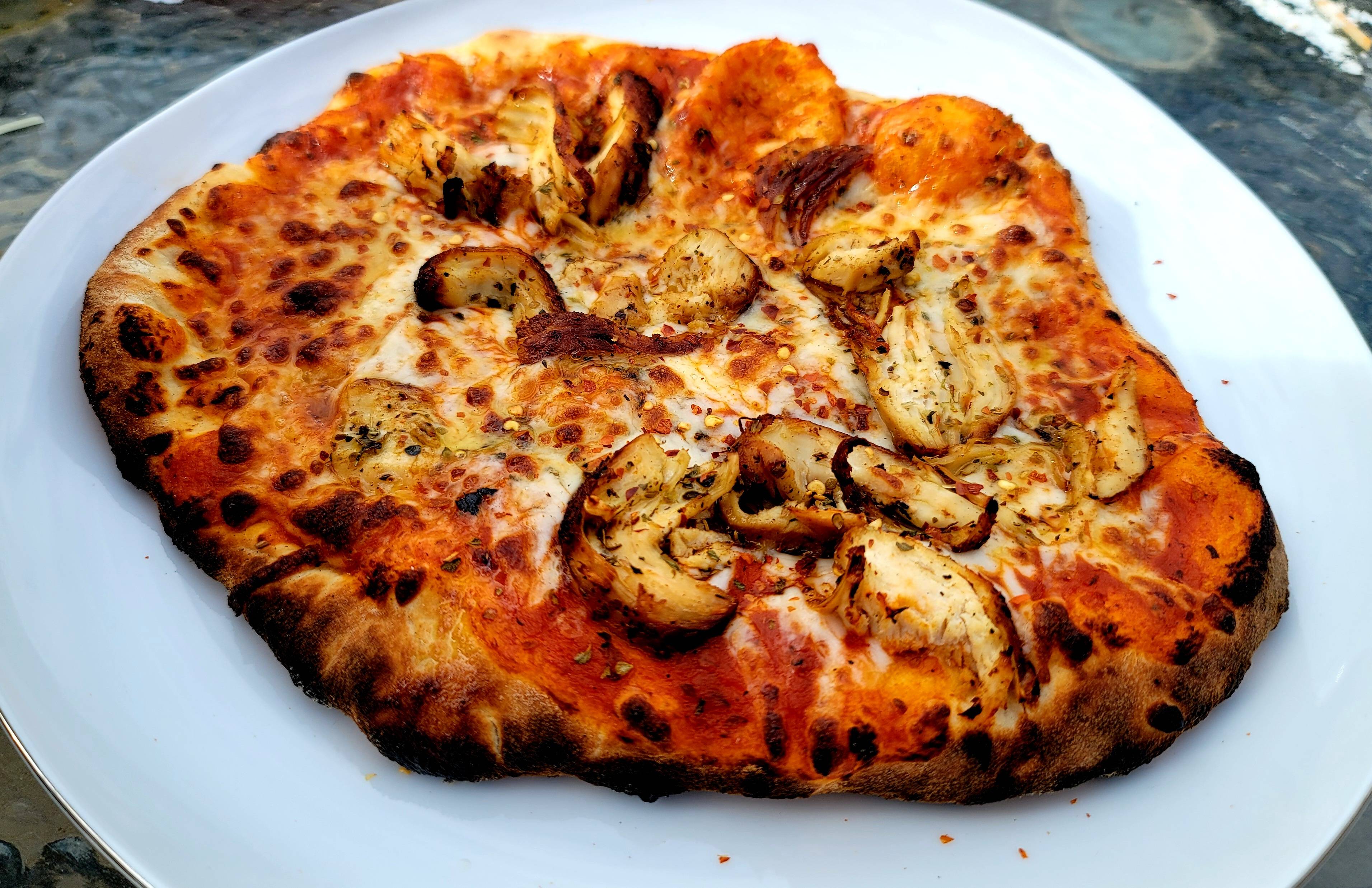Homemade Italian chicken Pizza from scratch using our new pizza oven