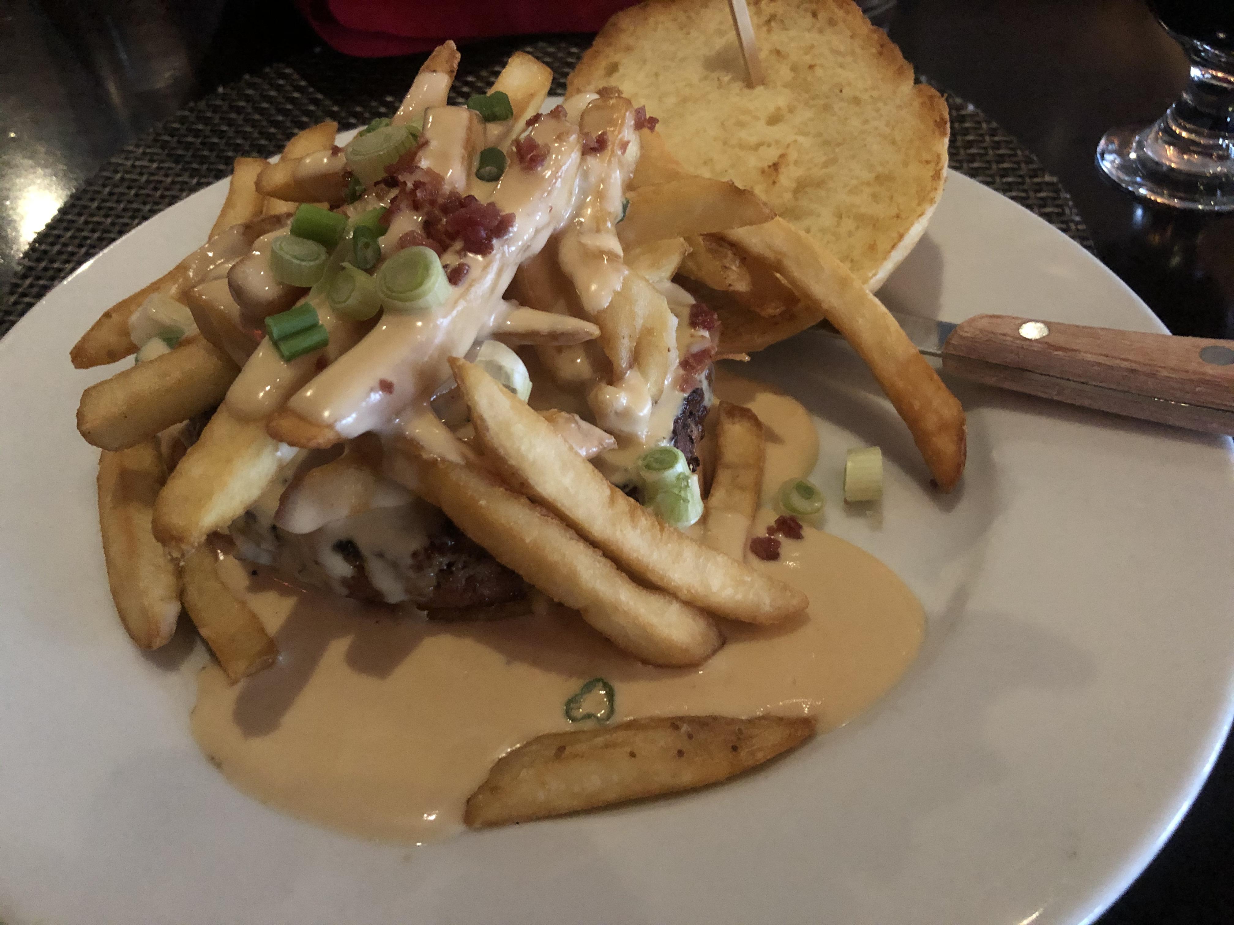 Horseshoe burger. Half pound 100 pure angus beef burger gets french