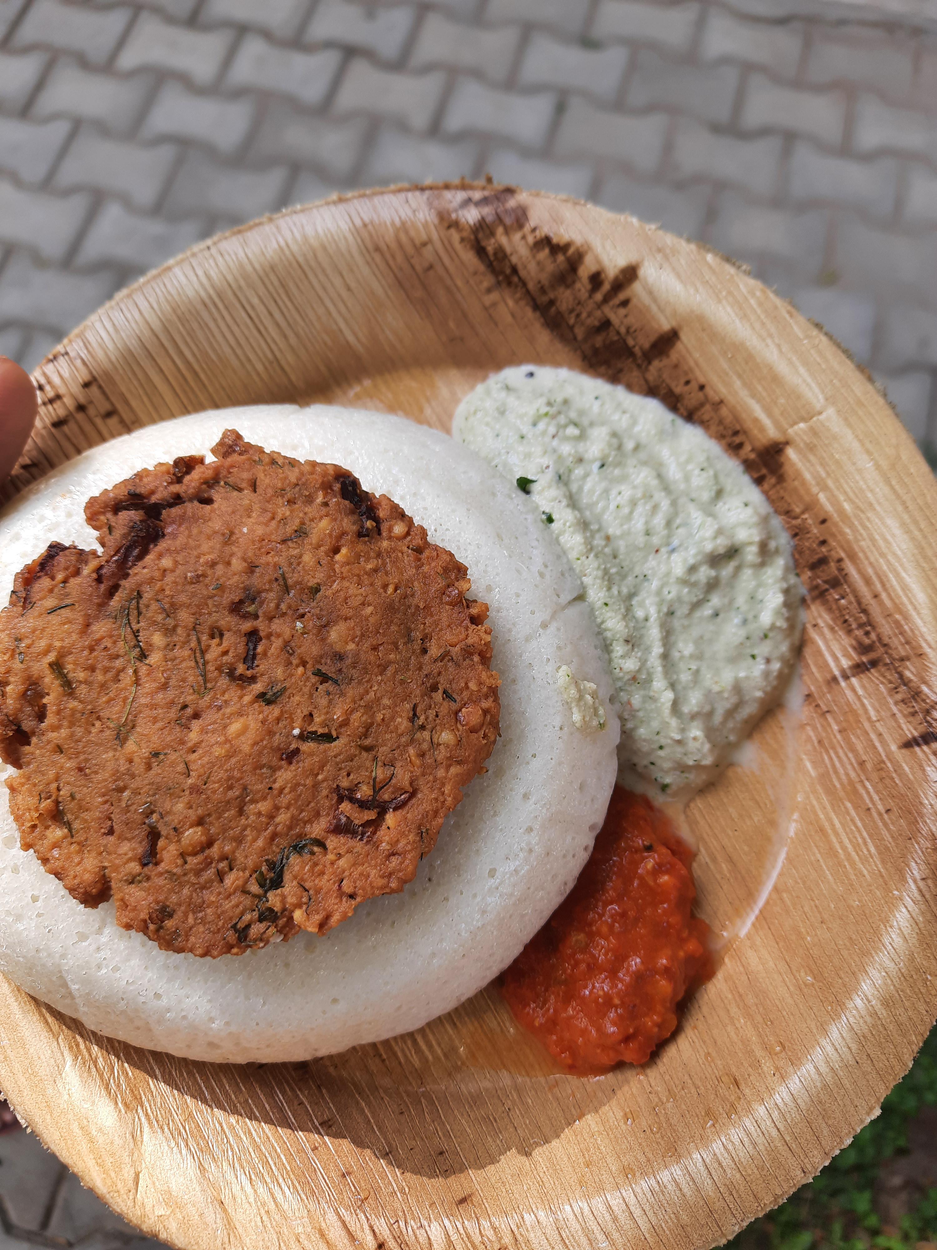 Idli ,vade, groundnut chutney, tomato chutney. Location Bengaluru