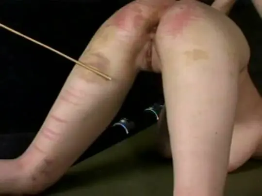 Missed cane stroke lands on her pussy
