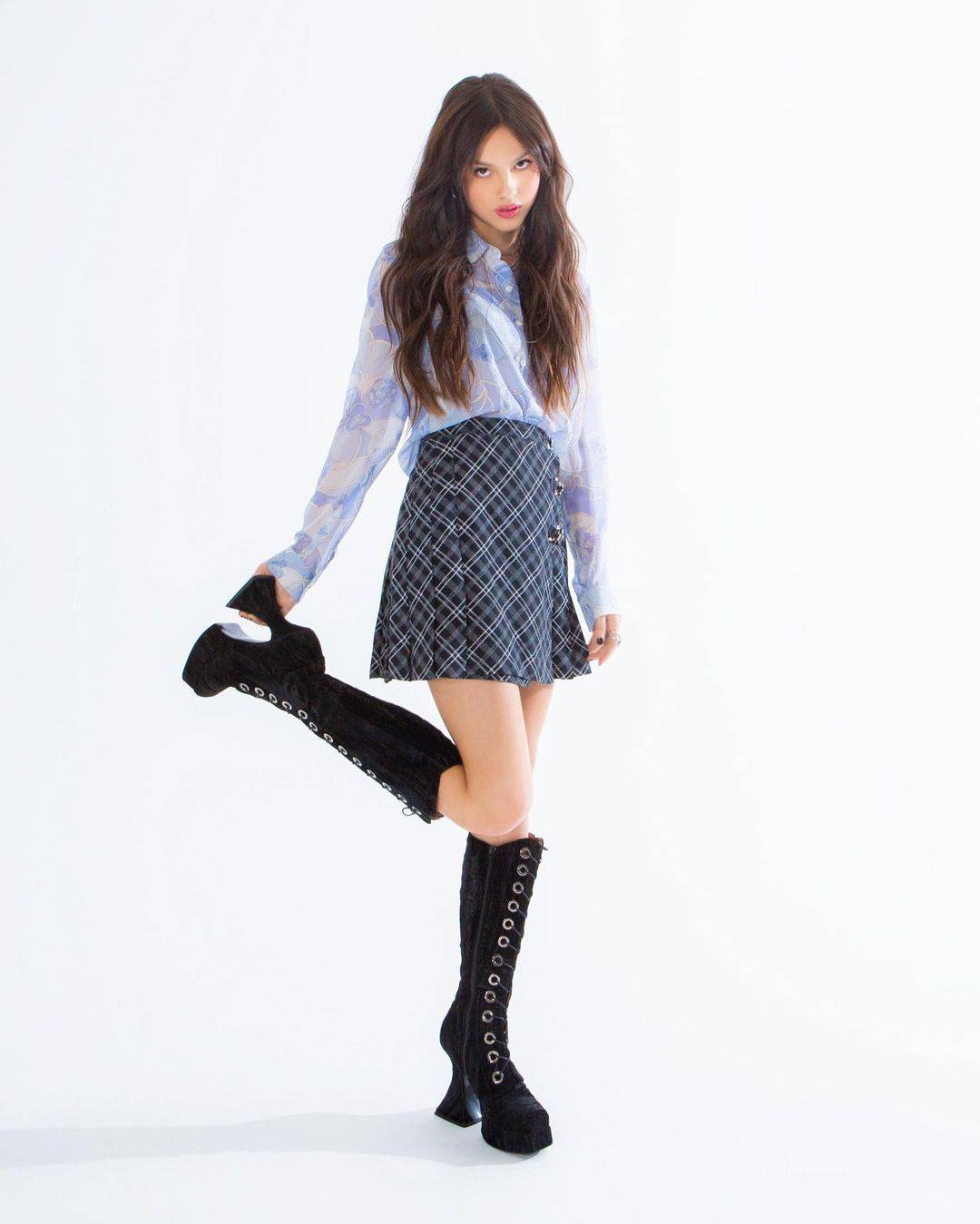 Olivia Rodrigo Short Skirt and Boots Scrolller