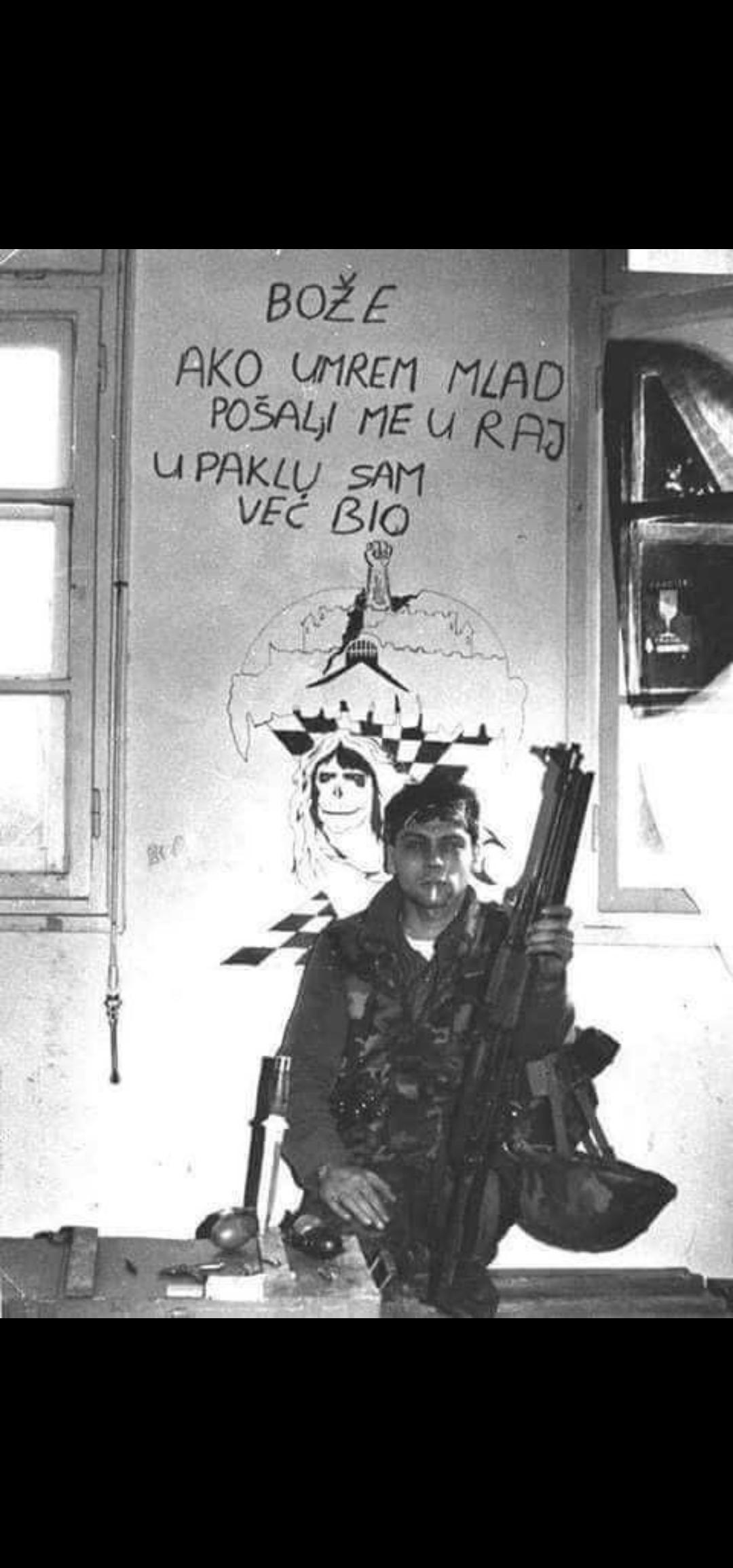 Photographed during war in Yugoslavia. Graphite means: 'God, if I die ...