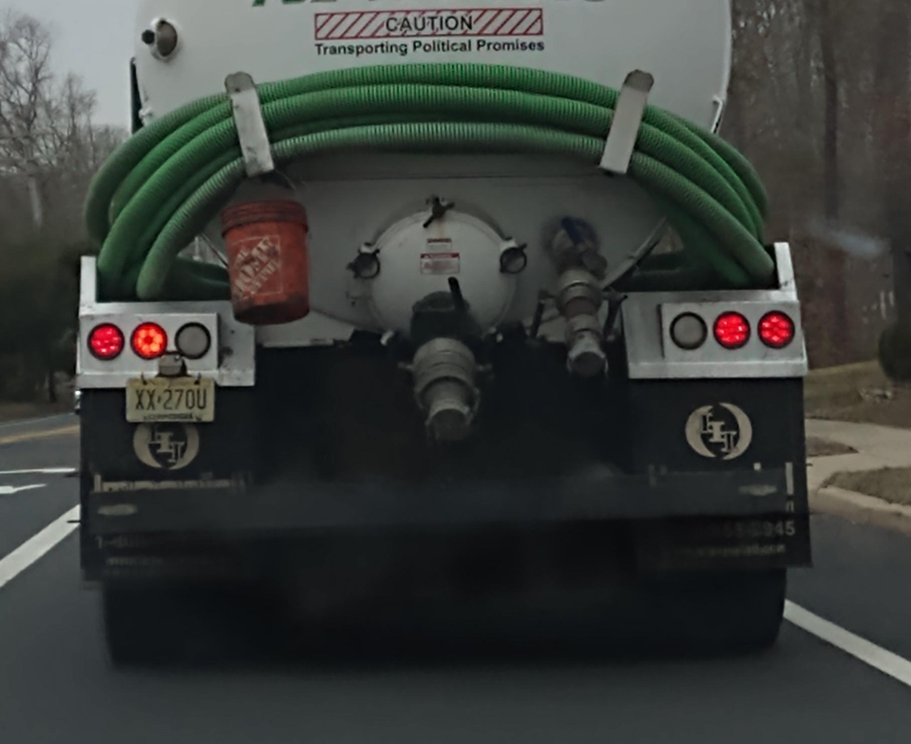 Poop truck hauling poop promises lol (zoom in under caution if needs be ...