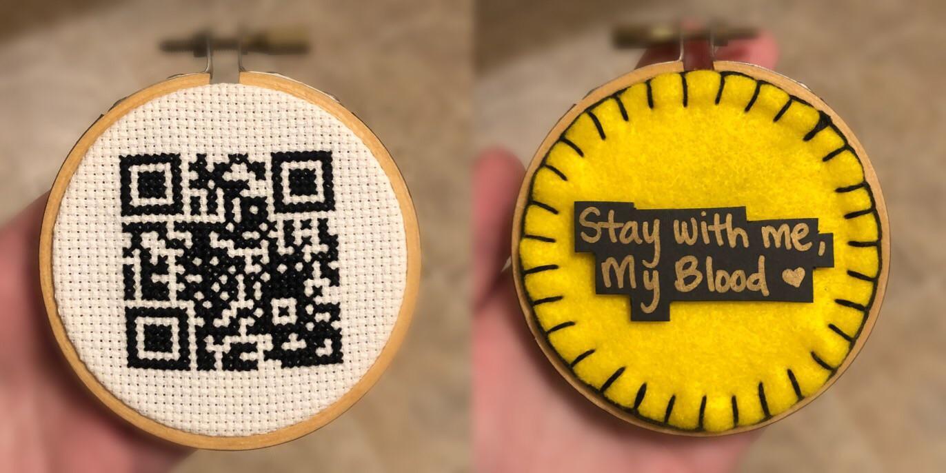 QR Code Cross Stitch I made for a friend When scanned it loads the