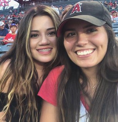 so who do you think is hotter? Me right or my little sister to the left