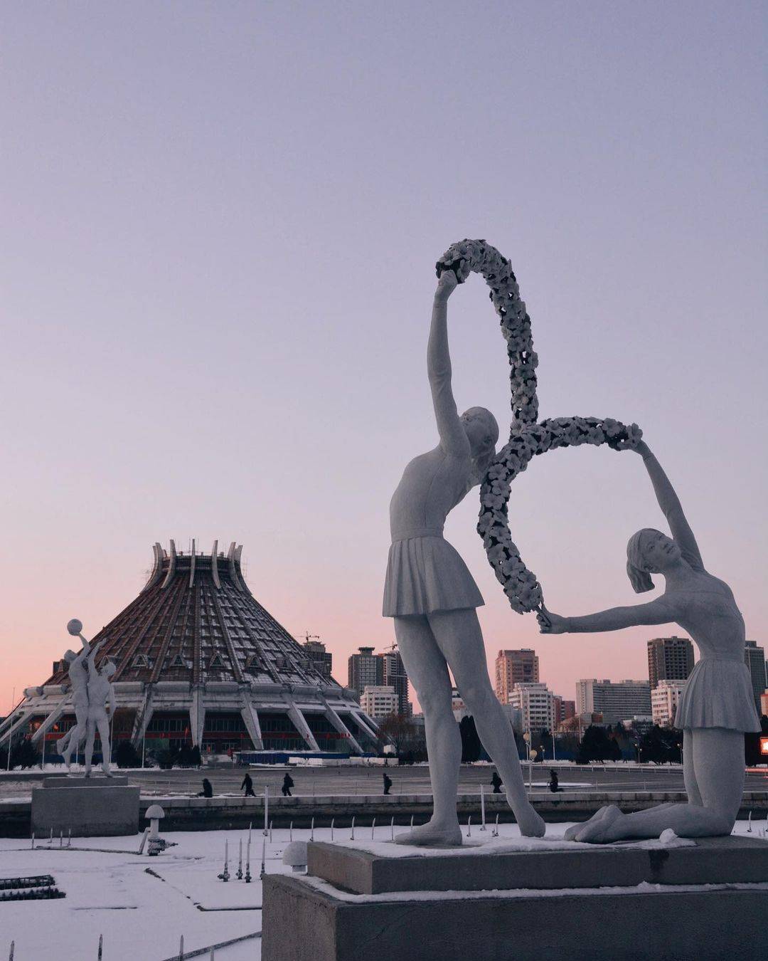 Statues in front of Pyongyang Ice Rink. Credit: __elena_s___ | Scrolller