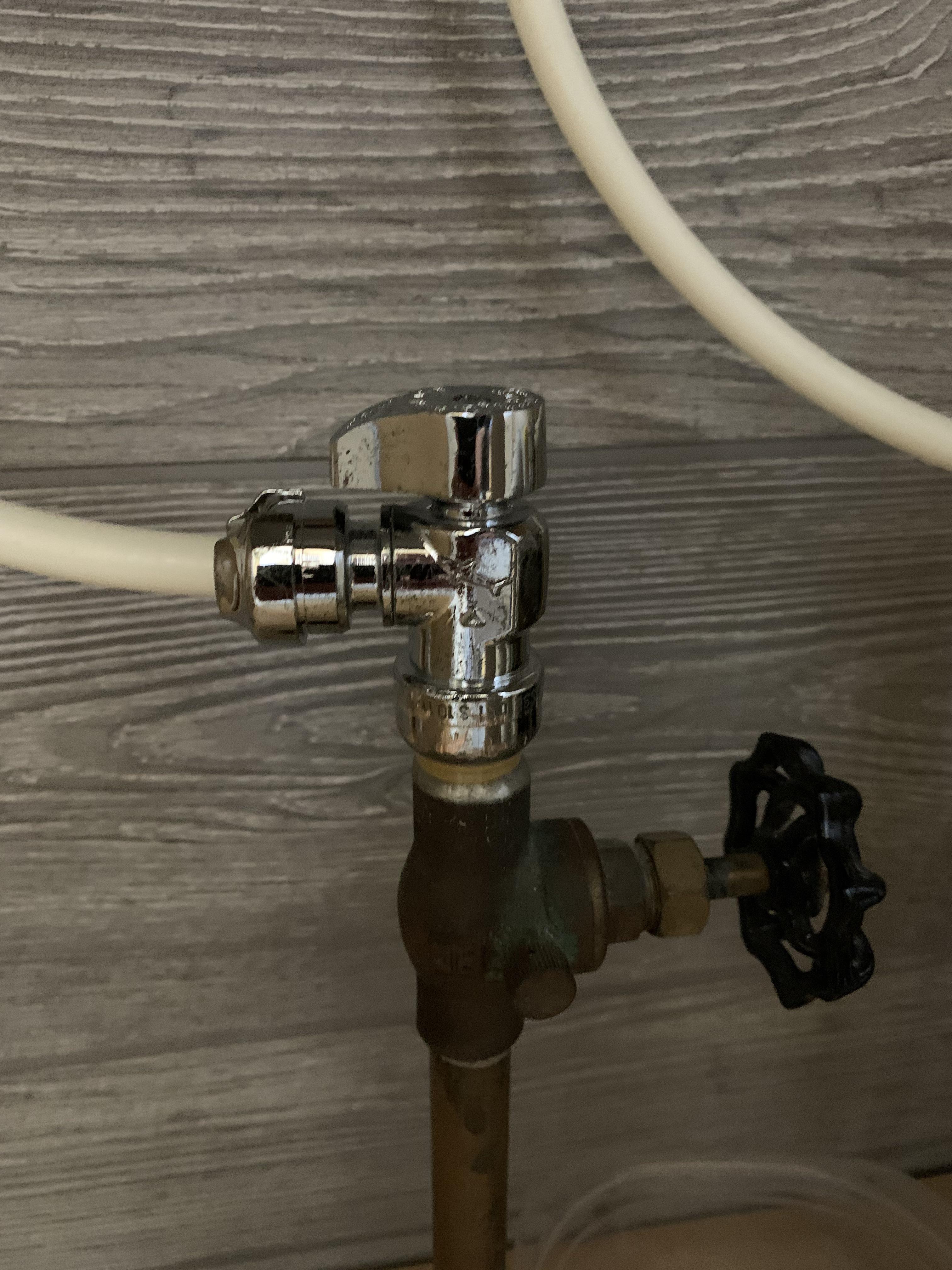 The hot water line under my sink doesn’t unscrew at the base, just