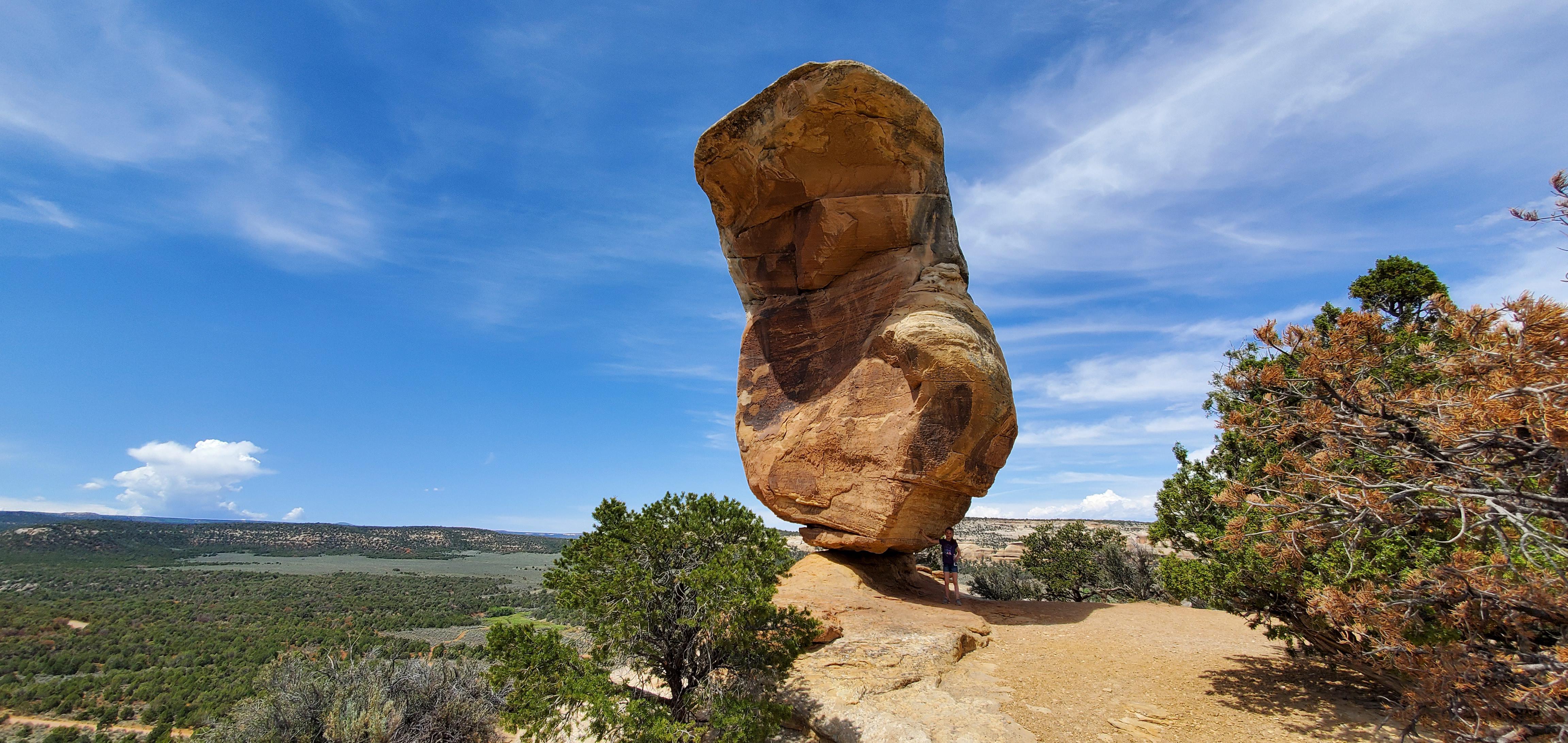 This massive rock pulling off a balancing miracle act Scrolller(00)