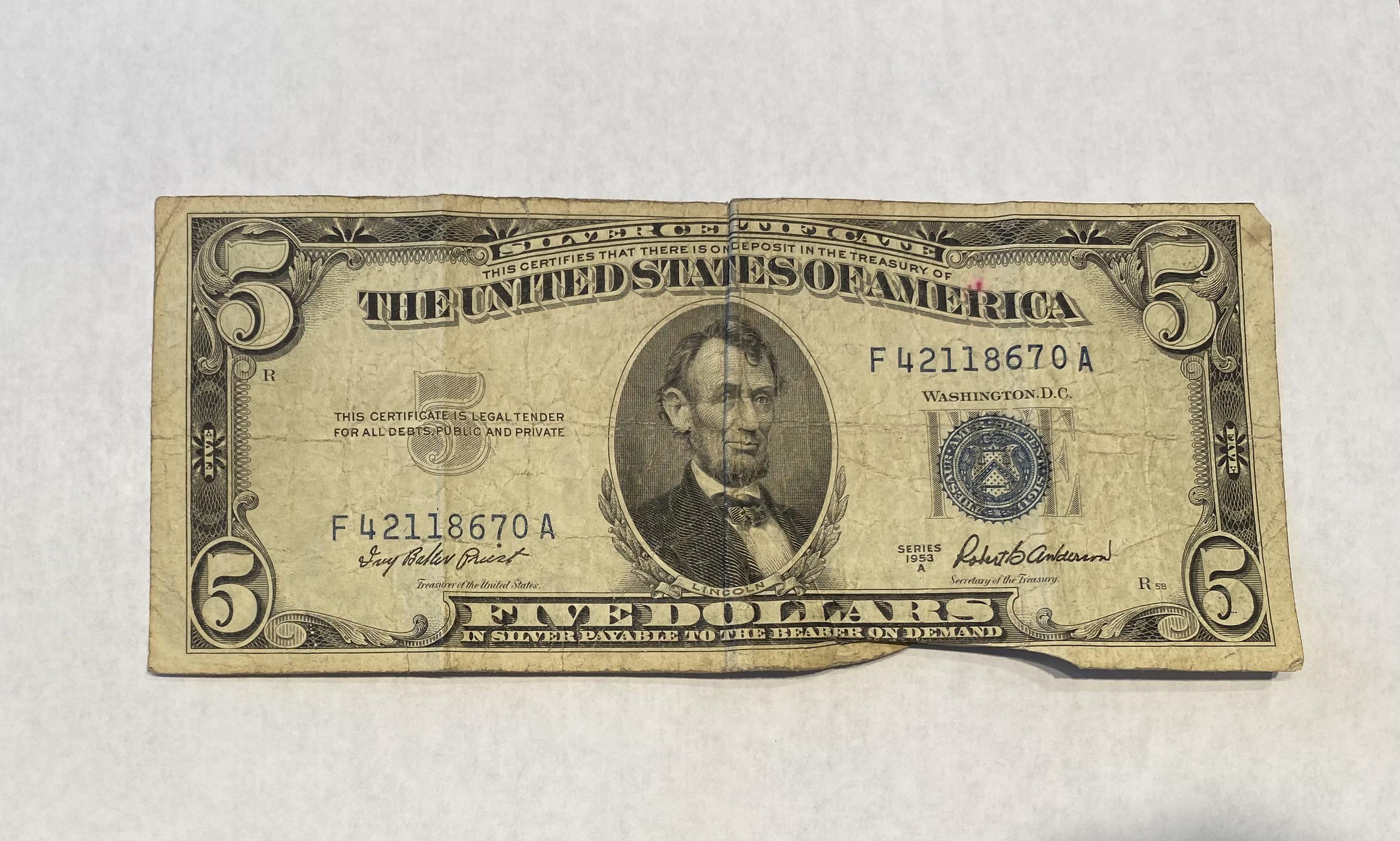 silver backed 5 dollar bill