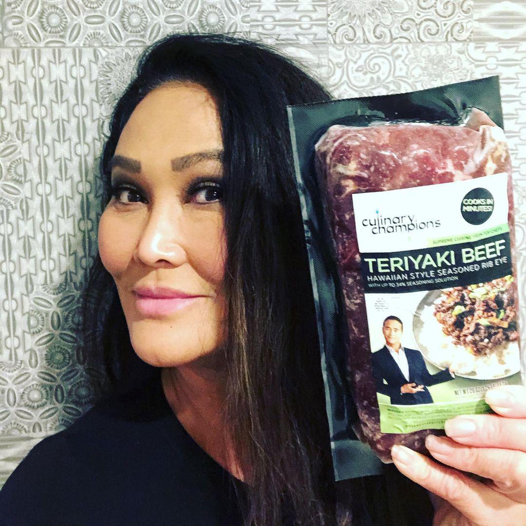Tia Carrere with teriyaki beef Scrolller
