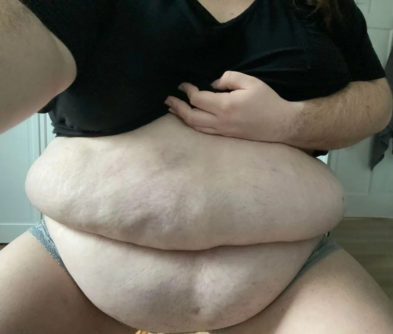 BBW white man with a fat belly bulge in a black t-shirt and grey underwear selfie