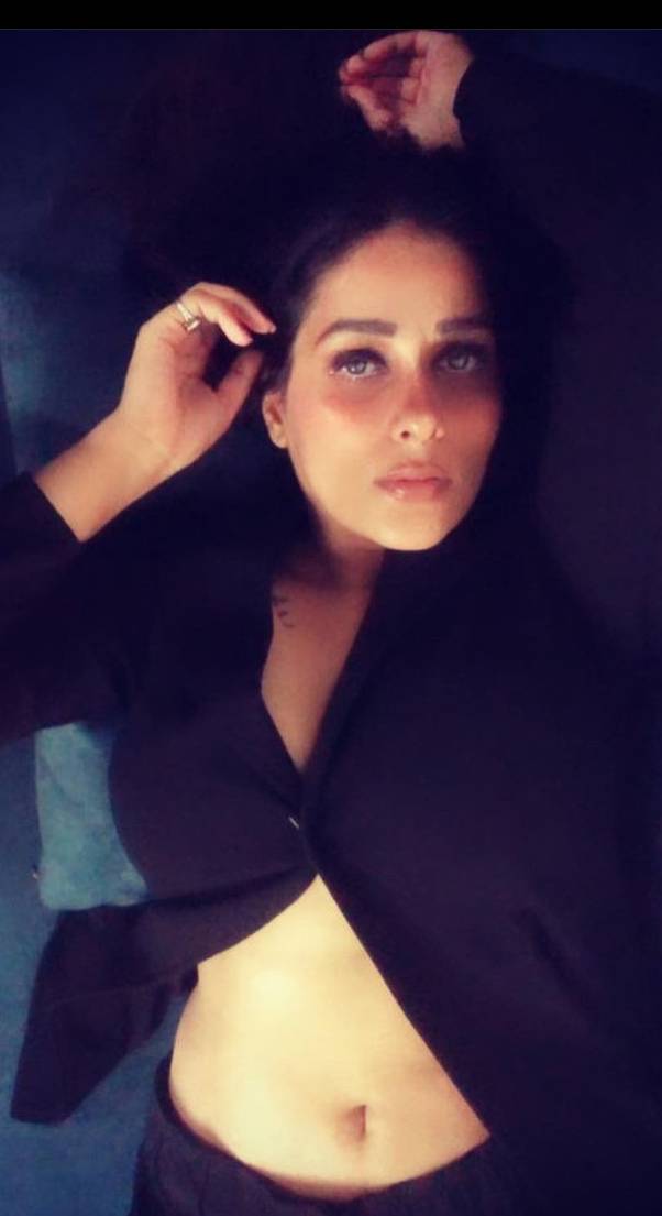 Vansheen Verma navel in black shirt and skirt Scrolller