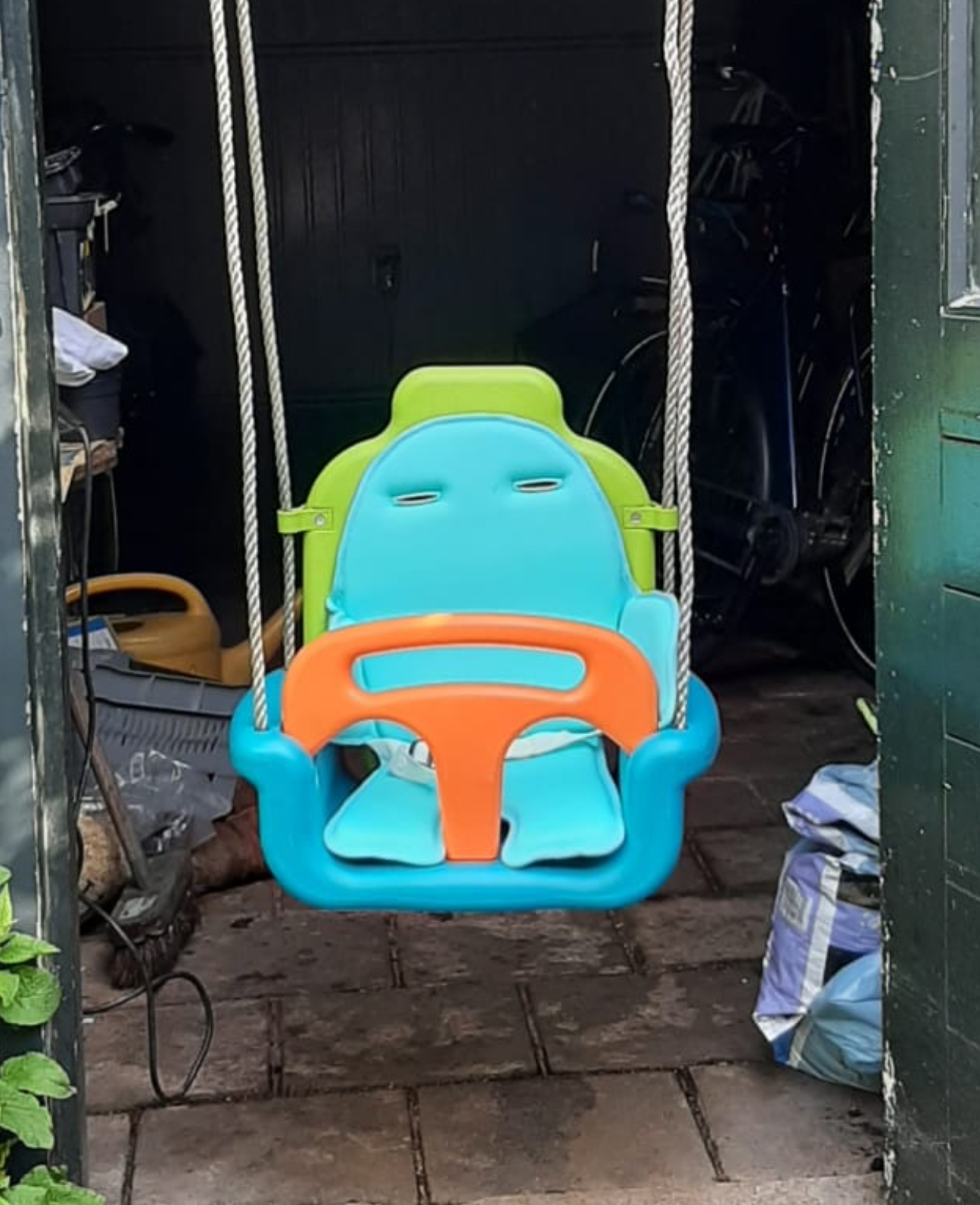 We put up a swing, he doesn't look excited Scrolller