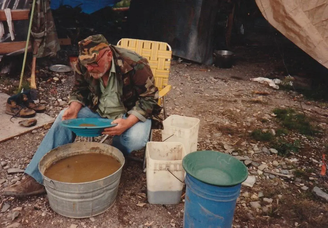 Working down the sample cons, Blue Ribbon Mine Alaska, buckets by size ...