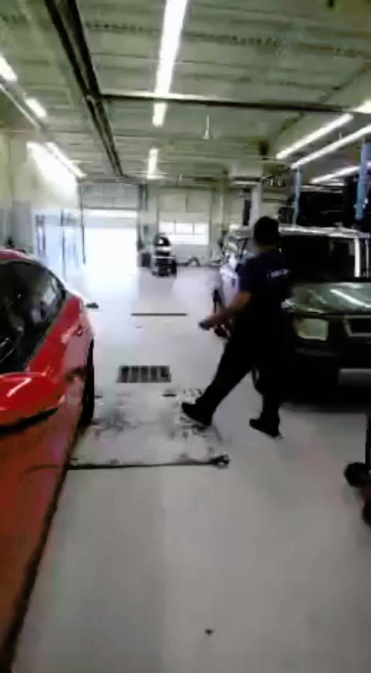 Inside a Bensalem, PA car dealership before a tornado ripped off the roof today. Scrolller