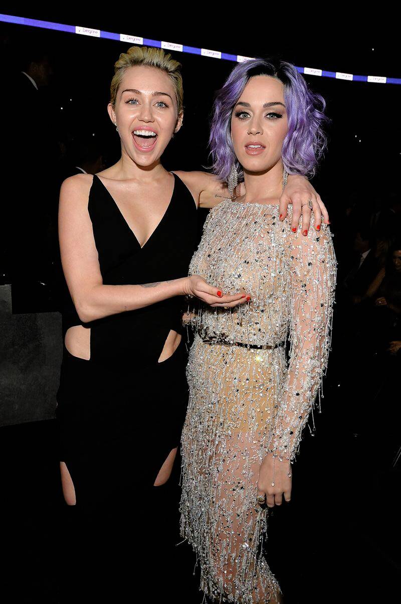 Miley Cyrus just can’t resist holding Katy Perry’s boobs | Scrolller