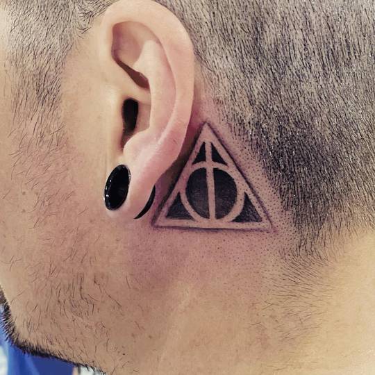 tattoos its small but it matches the deathly hallows behind my other  ear  rzelda