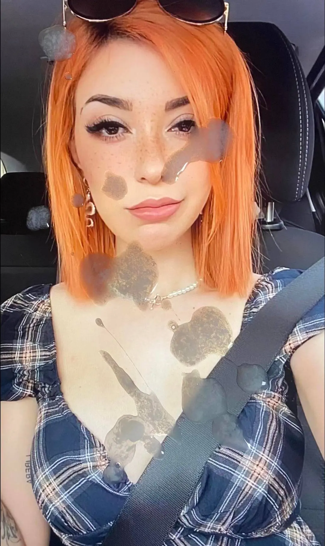 German celeb redhead woman in a blue plaid dress with a cumshot overlay selfie in a car