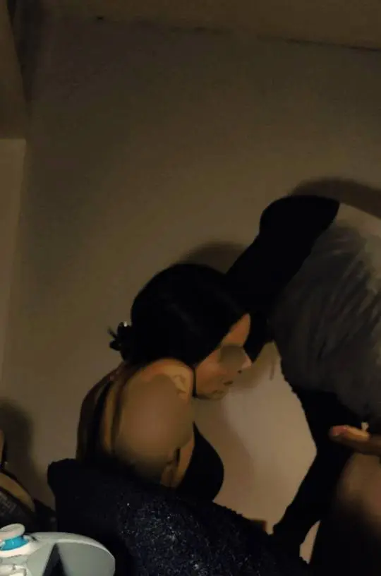 CFNM scene with a slim brunette woman in black lingerie and an athletic man in an intimate embrace.