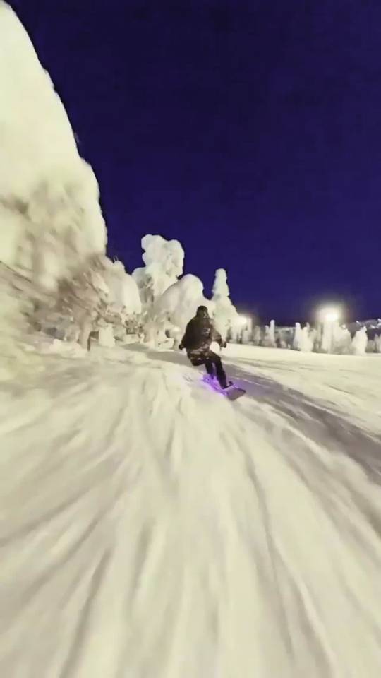 Snowboarding at night in Finland Scrolller