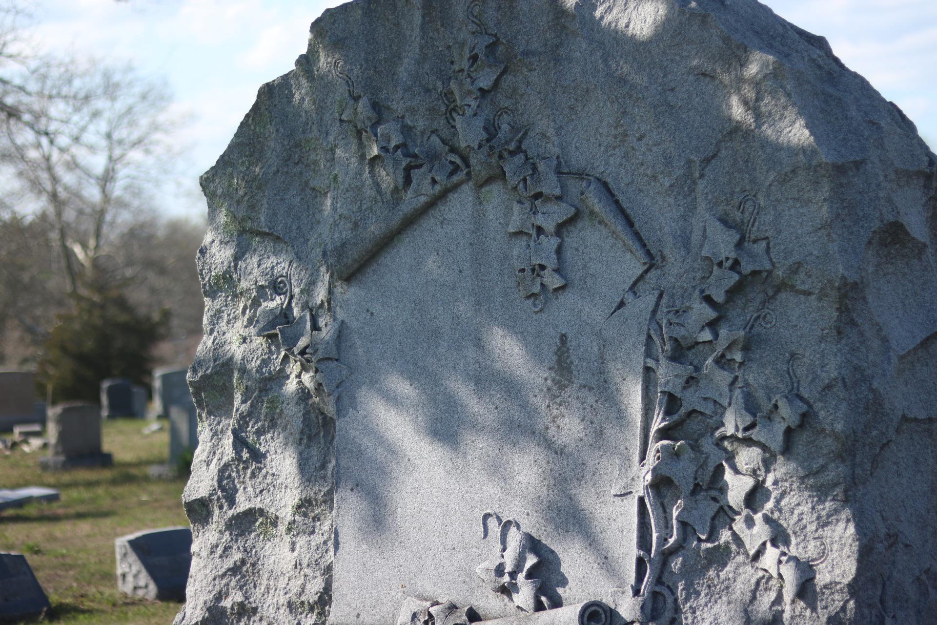 A large intricate tombstone from a local cemetery | Scrolller