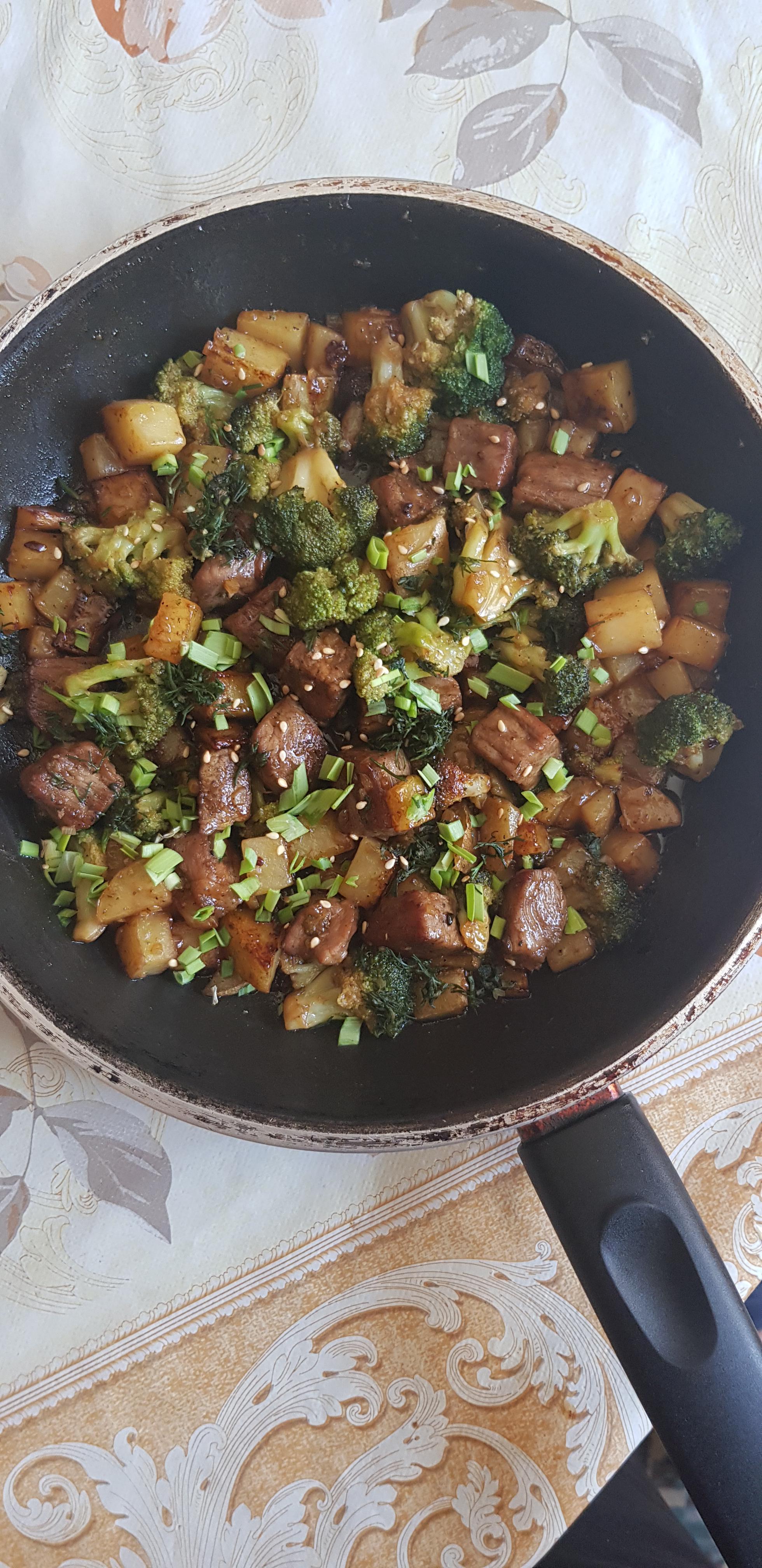 Buttery garlic stir fry with glazed steak bites, potatoes, and broccoli
