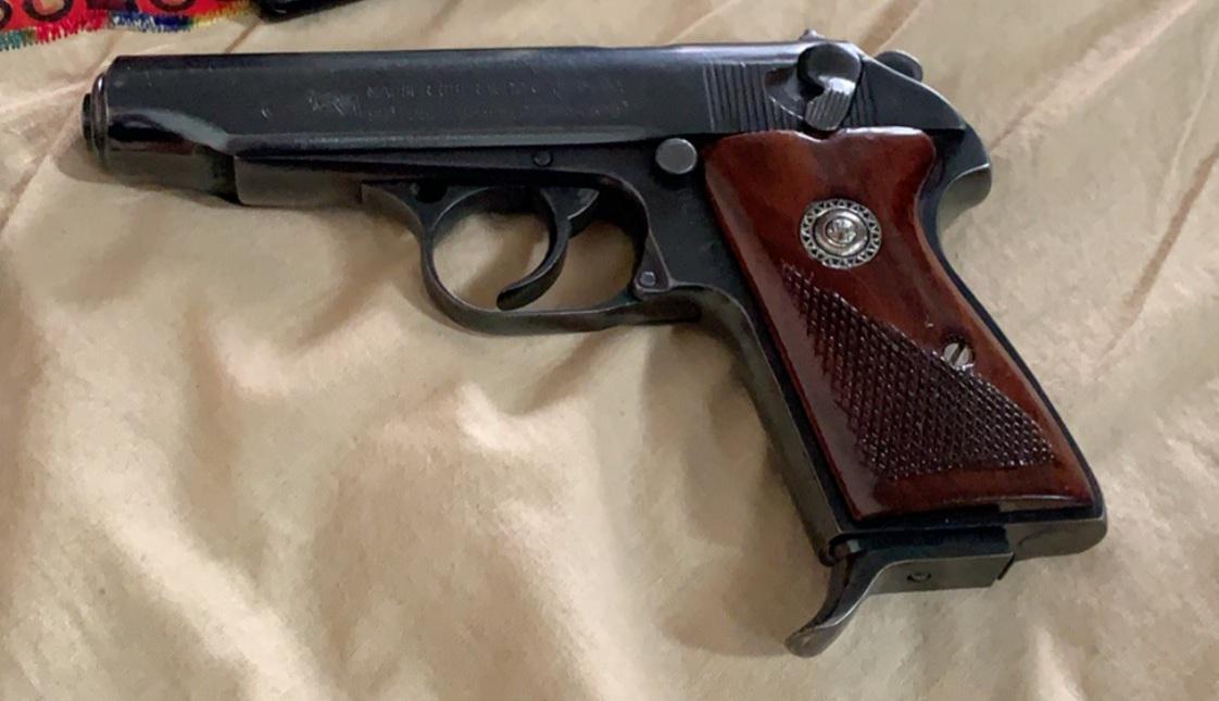Can anyone help identify this pistol? Markings are worn. | Scrolller