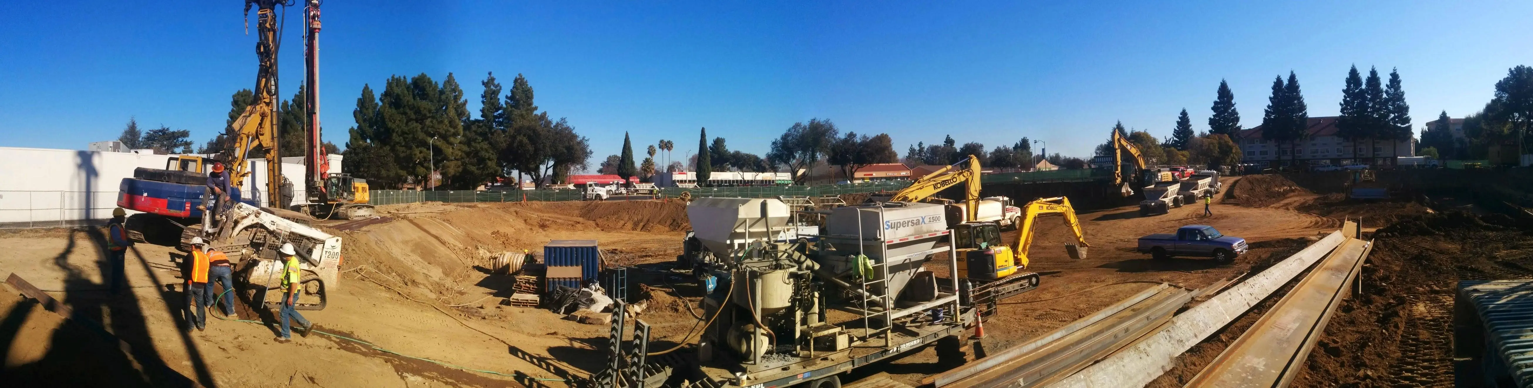 CSM soldier pile wall construction and soil offhaul panoramic, Mountain ...